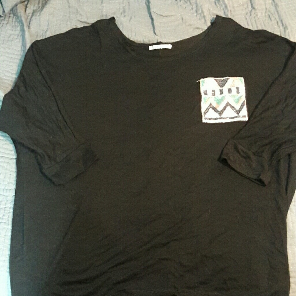 Black shirt with sequin pocket